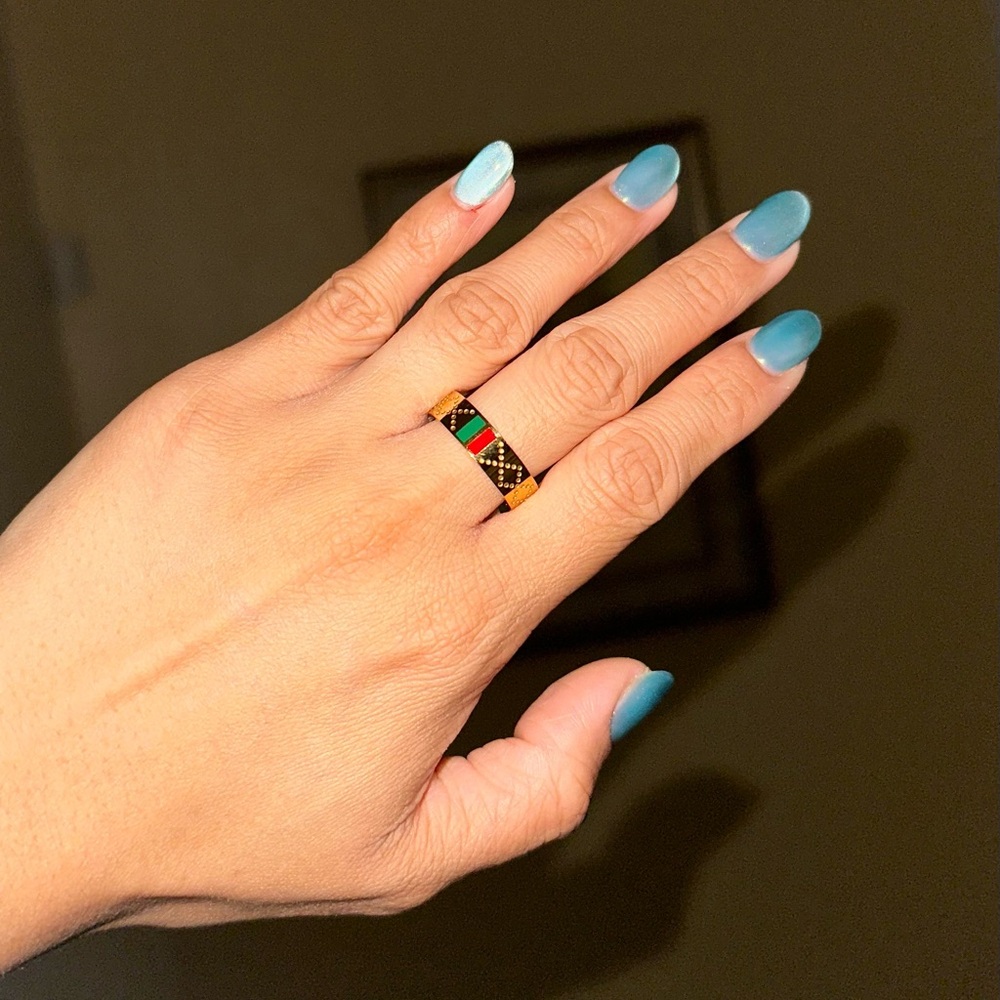 Gold Ring with Red and Green Accents